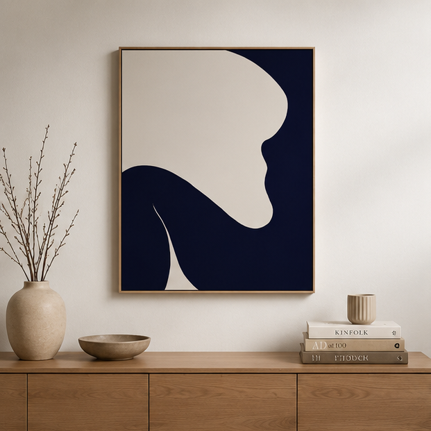 Navy and cream abstract canvas above oak sideboard with dried branches vase and round ceramic bowl