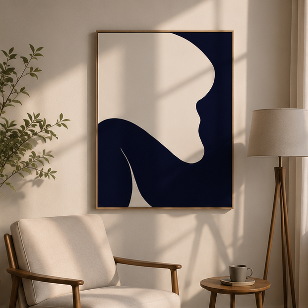Navy cream fluid abstract art beside floor lamp and linen armchair in sun-dappled minimalist living room